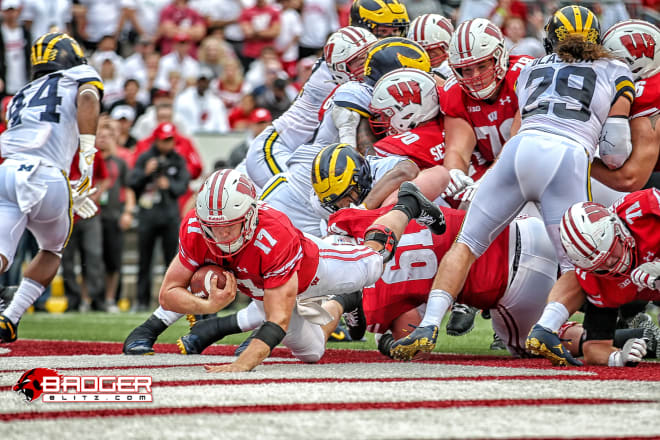 Quarterback Jack Coan rushed for two touchdowns in last season's 35-14 Wisconsin victory in Madison.