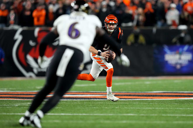 Former LSU teammates linebacker Patrick Queen of the Baltimore Ravens (No. 6) and quarterback Joe Burrow of the Cincinnati Bengals eye each other in the Bengals' 24-17 NFL Wild Card win over the Ravens.