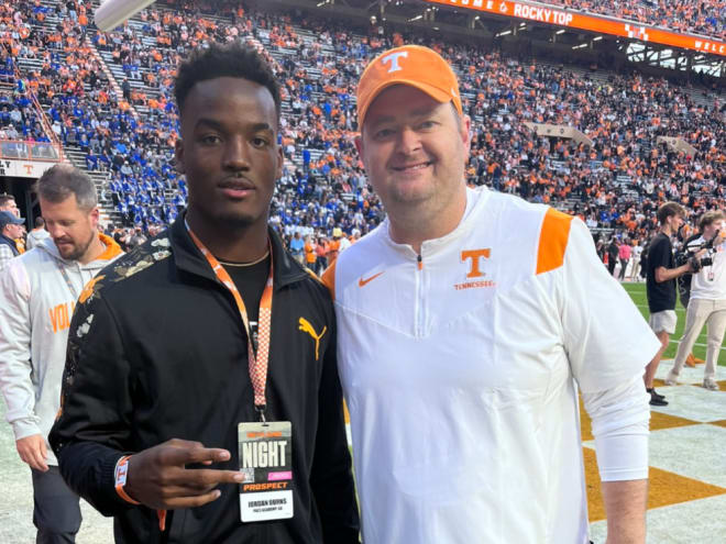2024 linebacker Jordan Burns poses for a photo with Tennessee coach Josh Heupel. 