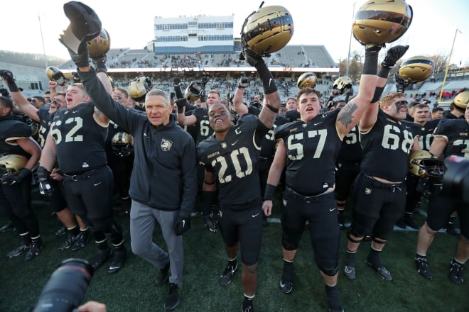 Coach Monken's 100th win came against the UConn Huskies 