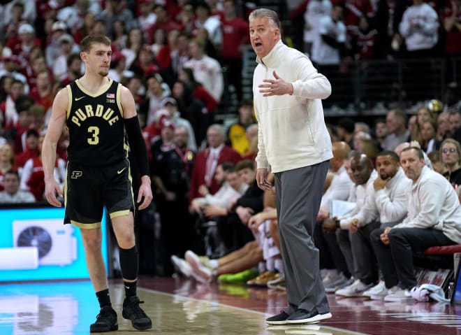 Purdue guard Braden Smith (3) listens to head coach Matt Painter during the second half of their game Sunday, February 4, 2024 at the Kohl Center in Madison, Wisconsin. Purdue beat Wisconsin 75-69.