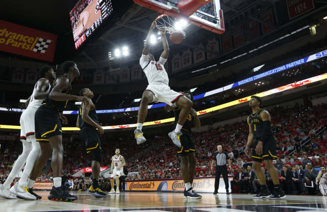 NCSU redshirt freshman center Manny Bates goes up for two of his six points scored Sunday in a home win over Appalachian State.