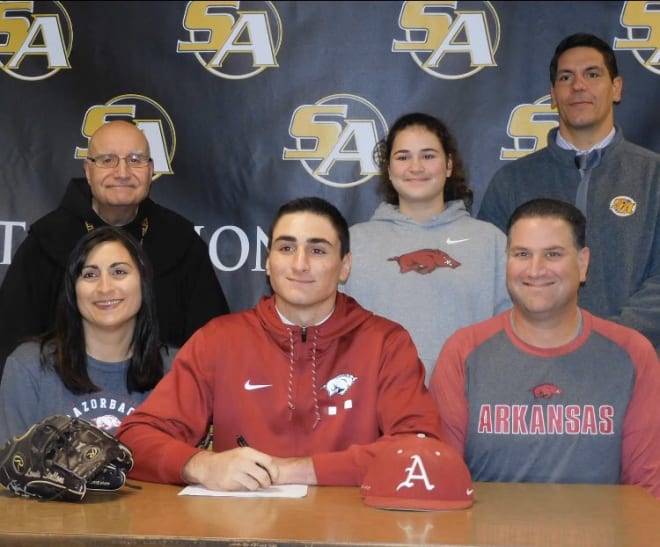 Louis Stallone is a 6-foot-9 right-handed pitcher who is signed with Arkansas.