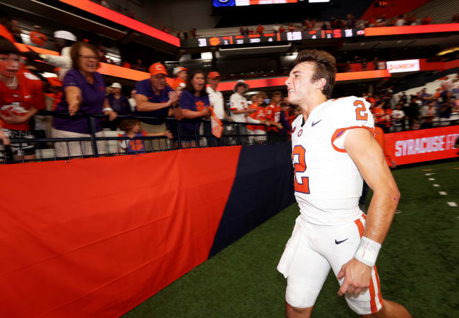 Quarterback Cade Klubnik walks over to Clemson fans in the JMA Wireless Dome to celebrate Saturday following the Tigers' 31-14 win over Syracuse.