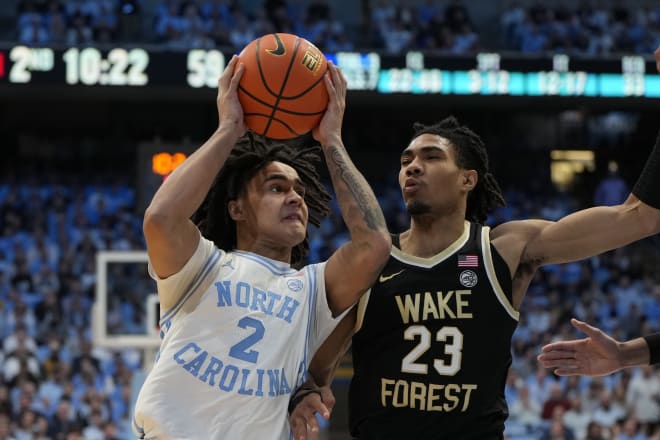 Wake Forest's Hunter Sallis defends UNC's Elliot Cadeau during Monday night's game. 