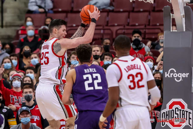 Kyle Young brings down a rebound against Northwestern, which Chris Holtmann said was the worst defensive rebounding performance in four years.