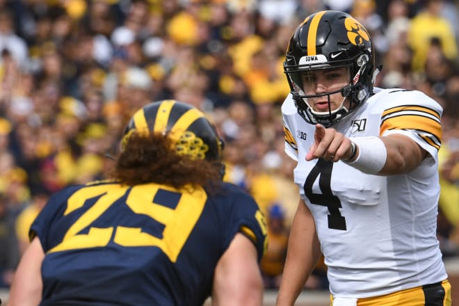 Iowa quarterback Nate Stanley pointed at the Wolverines, but they put a target on him all day long.