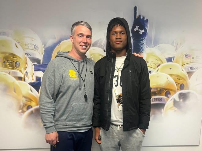 Notre Dame quarterbacks coach Gino Guidugli, left, has developed a strong connection with 2025 quarterback recruit Deuce Knight.