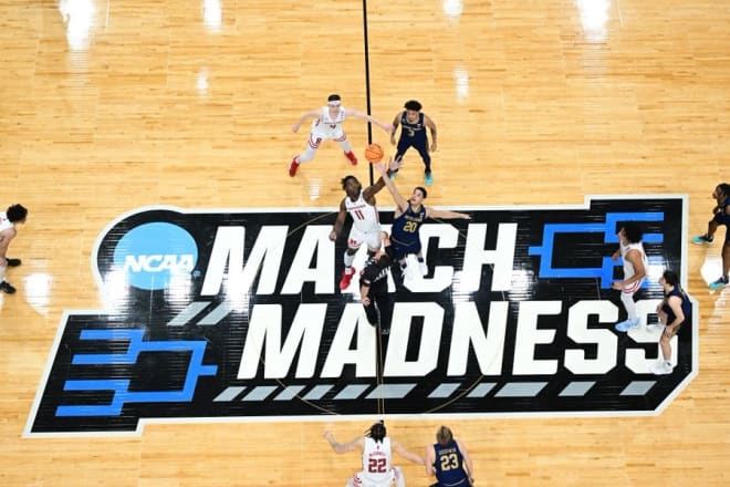 Rutgers and Notre Dame compete for the opening tip of the Frist Four game on March 16, 2022 at UD Arena in Dayton, OH.