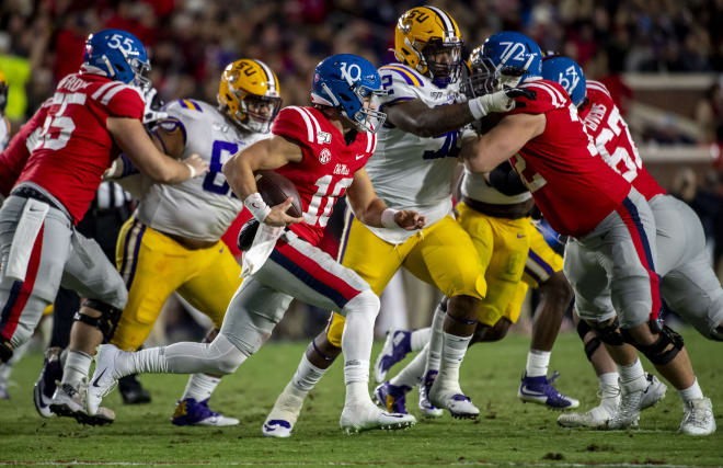 Ole Miss quarterback John Rhys-Plumlee taking off against LSU.