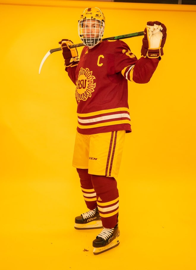 a on hockey uniform