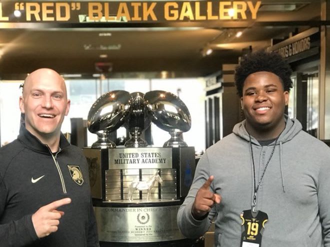Army defensive line coach Chad Wilt with newest Army commit, DT Billy Wooden