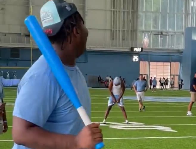 Five-star class of 2022 DT Travis Shaw facing Dre' Bly on the mound in whiffle ball Saturday at UNC. 