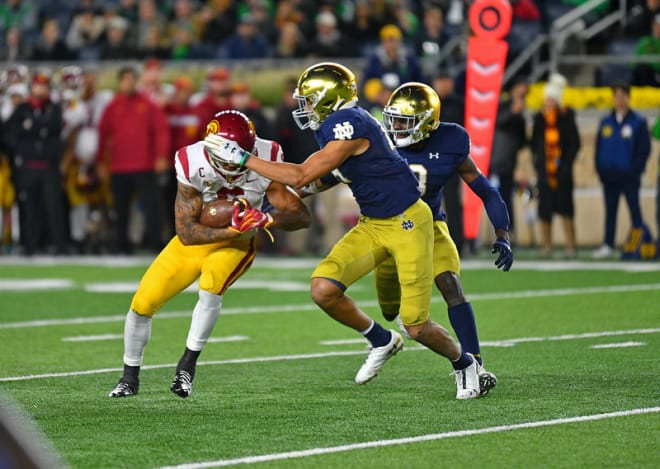 Notre Dame sophomore safety Kyle Hamilton making a tackle versus USC in 2019
