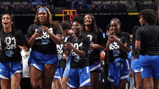 The University of Memphis Women's Team celebrates together at Memphis Madness