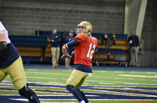 Ian Book and his Notre Dame teammates held a two-hour practice indoors on Tuesday.