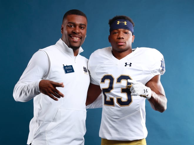 Notre Dame cornerbacks coach Mike Mickens (left) played a key role in Micah Bell's (right) recruitment.