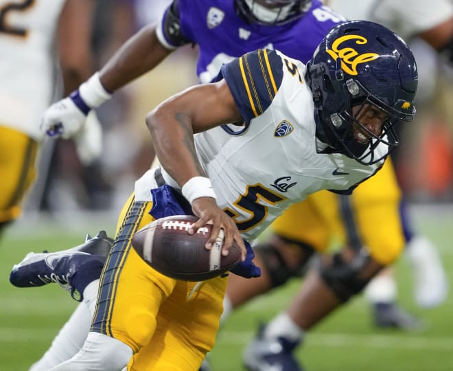 Sam Jackson V escapes the pocket on a play during Cal's loss to Washington on Saturday.