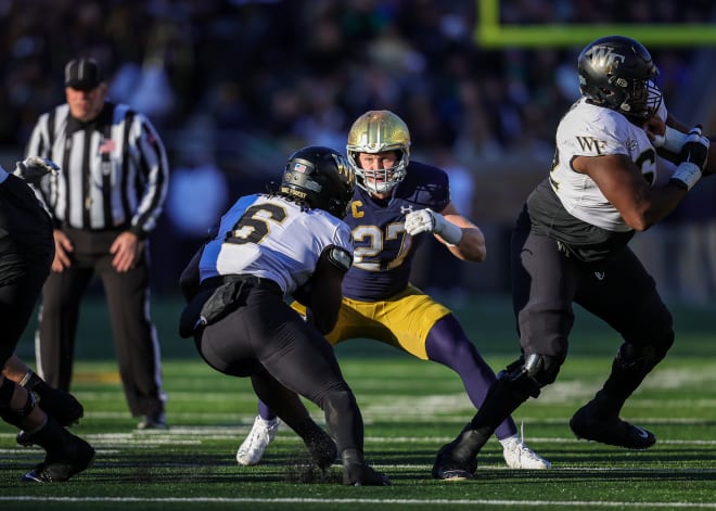 Notre Dame linebacker and leading tackler JD Bertrand (27) is a finalist for the 2023 Wuerffel Trophy.