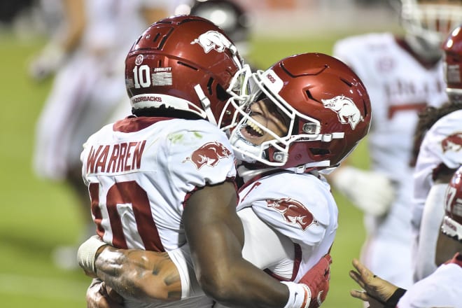 De'Vion Warren and Feleipe Franks celebrate after a touchdown against No. 16 Mississippi State