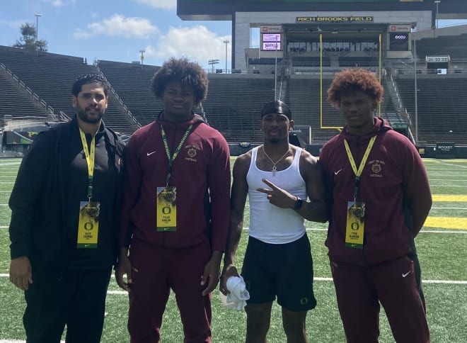 Defensive linemen Tyriq Blanding (right) and Tyler Partlow spent time with fellow New York native Seven McGee during a visit for Oregon's spring game over the weekend.