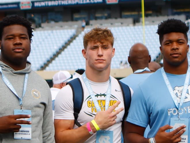 Evan Bennett (center) was the first commit in North Carolina's class of 2024