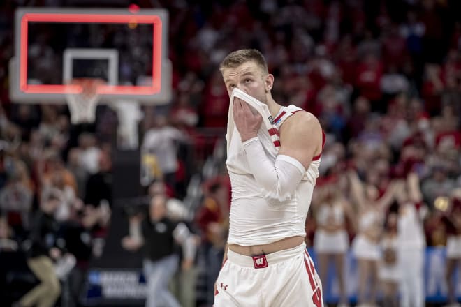 Senior guard Brad Davison wipes his eyes as the final horn sounds in Iowa State's 54-49 victory over Wisconsin.