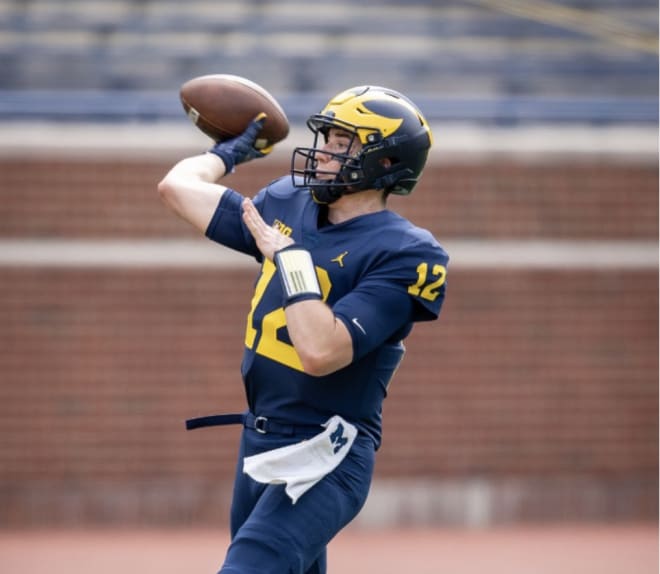 Michigan Wolverines football quarterback Cade McNamara threw for four touchdowns last season against Rutgers.