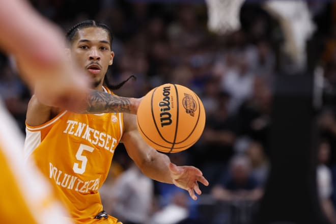 Mar 31, 2024; Detroit, MI, USA; Tennessee Volunteers guard Zakai Zeigler (5) plays the ball in the first half against the Purdue Boilermakers during the NCAA Tournament Midwest Regional Championship at Little Caesars Arena. 
