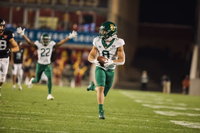Jalen Pitre with one of his Pick 6s last year for the Bears.