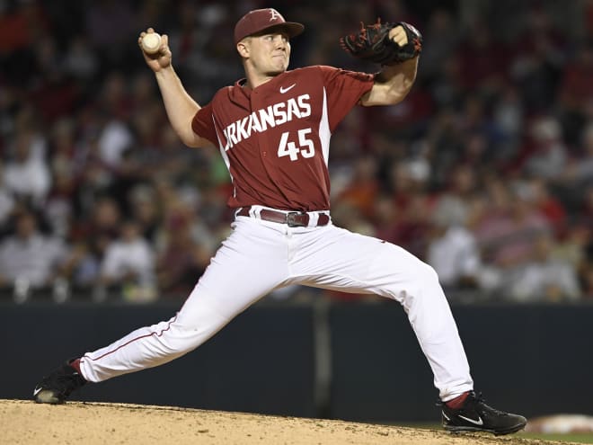 Former Razorback Kevin Kopps cheering hard for former team