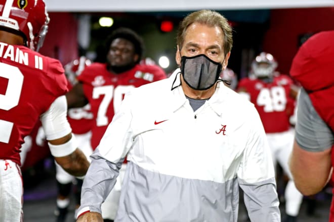 Alabama Crimson Tide head coach Nick Saban leads his team onto the field before playing then Ohio State Buckeyes in the 2021 College Football Playoff National Championship Game. Photo | Imagn