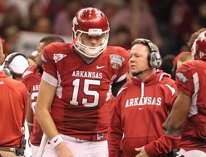 Former Arkansas quarterback Ryan Mallett and former Razorback head coach Bobby Petrino.