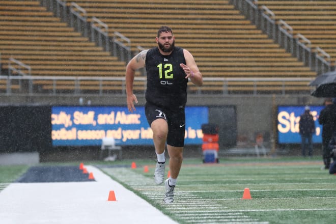Curhan worked at guard during the Senior Bowl in January