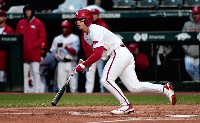 Robert Moore had three RBIs in Arkansas' SEC-opening win over Kentucky on Friday.