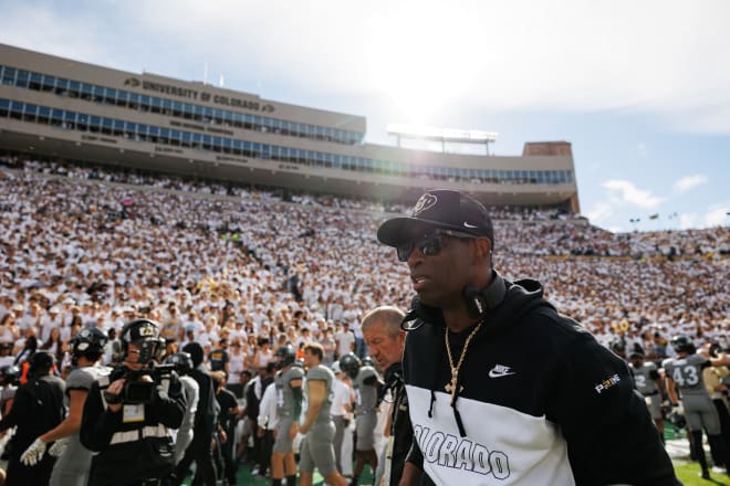 Colorado head coach Deion Sanders walks off the field at Folsom Field.