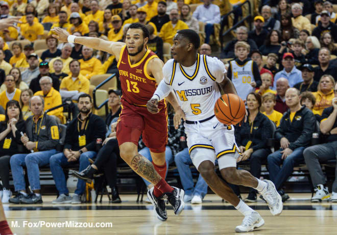 Hodge made five three-pointers and was one of five Tigers in double figures