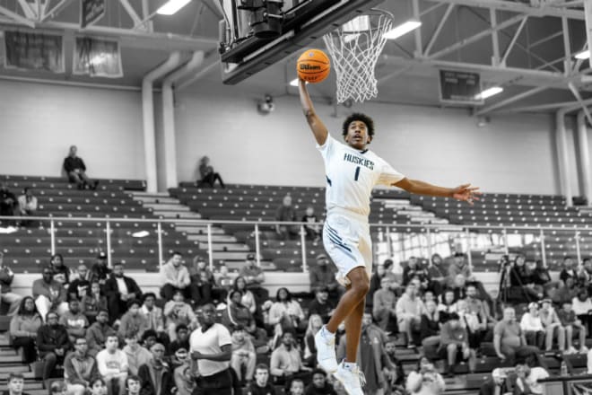 Heritage Huskies (NC) guard Lucas Taylor scores on a transition dunk against Grace Christian (NC) in the 2019 John Wall Holiday Invitational.