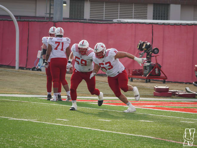 Nebraska offensive lineman Nouredin Nouili (63) and Henry Lutovsky (59).