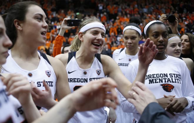 Oregon State's Sydney Wiese, center, celebrates with teammates after Oregon State defeated Creighton 64-52 in a second-round game in the NCAA women's college basketball tournament Sunday, March 19, 2017, in Corvallis, Ore.