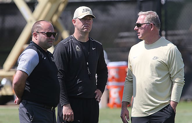 Purdue's football scheduling philosophy is shaped by these three men: deputy AD Jason Butikofer (left), Jeff Brohm (middle) and AD Mike Bobinski (right)