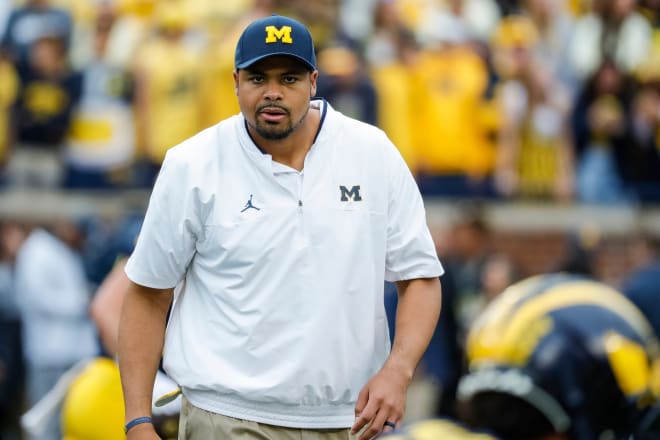 Grant Newsome roams the sideline during warmups before Michigan's game against Maryland on September 24. (USA Today)