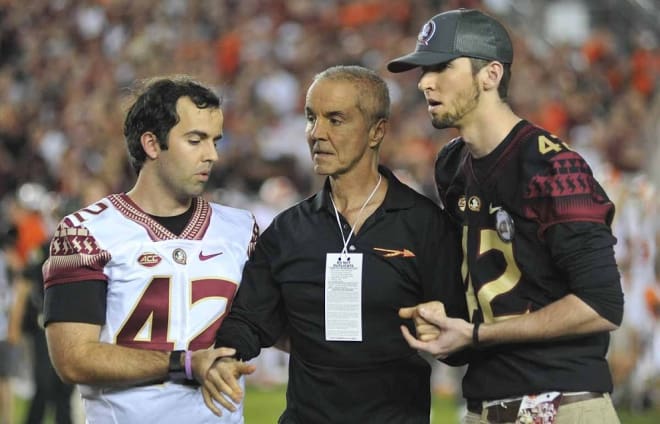 Florida State Hall of Fame member Monk Bonasorte was honored before the FSU-Clemson game. He was escorted onto the field by his sons, T.J. and Rocky.
