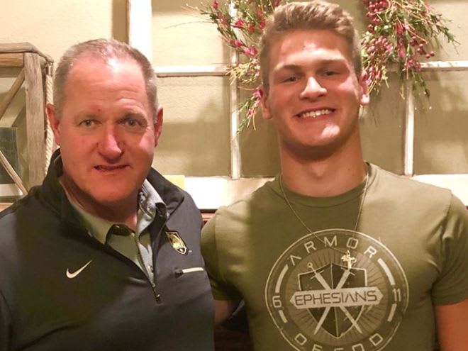 DE/OLB Kaghen Roach received a home visit from Army assistant coach, Kevin Corless