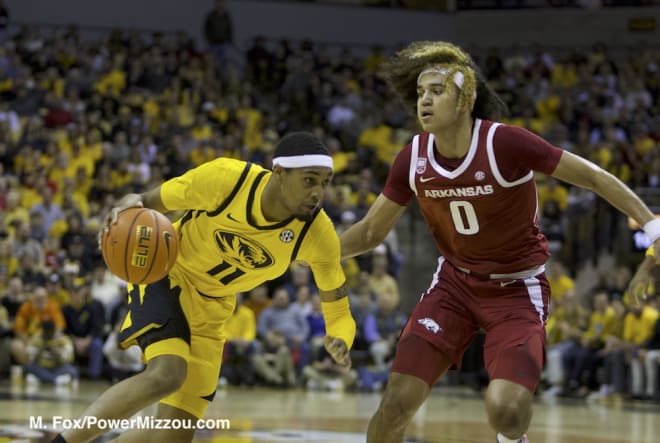 For college basketball players, long shorts might finally be