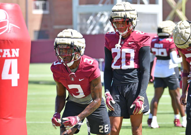 Kevin Knowles (No. 3) and Azareye'h Thomas (No. 20) both had impressive plays during the first day of fall camp on Wednesday.
