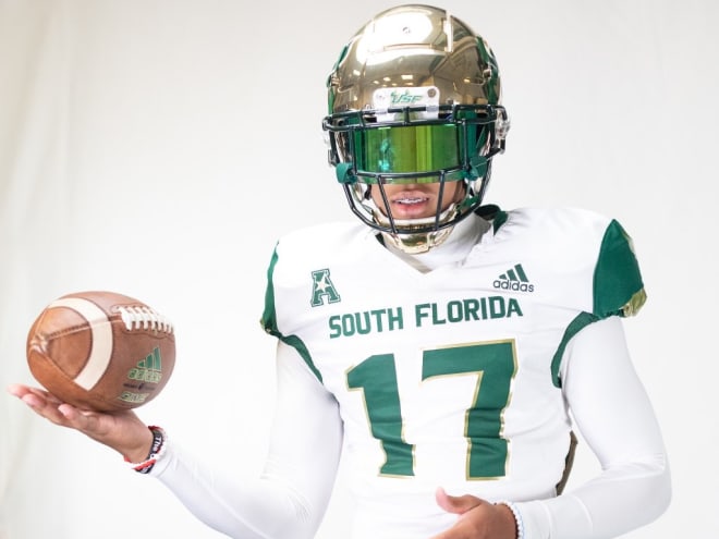 Brown poses during his USF visit