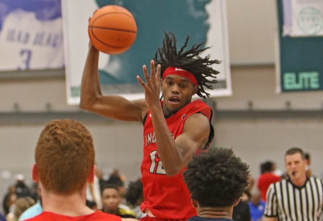 The Indy Heat's Keion Brooks grabs a rebound.