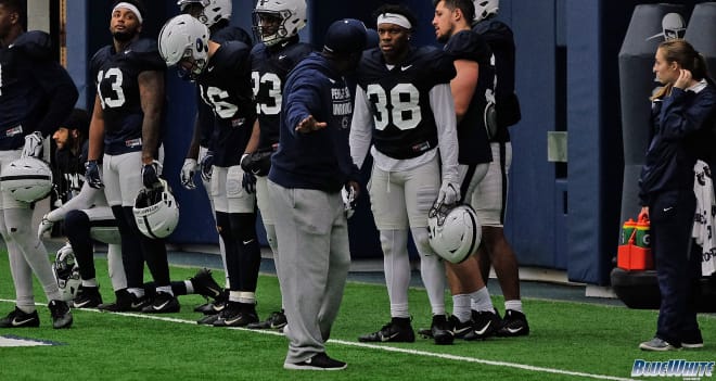Banks at work instructing Lamont Wade during a 2019 spring practice session.