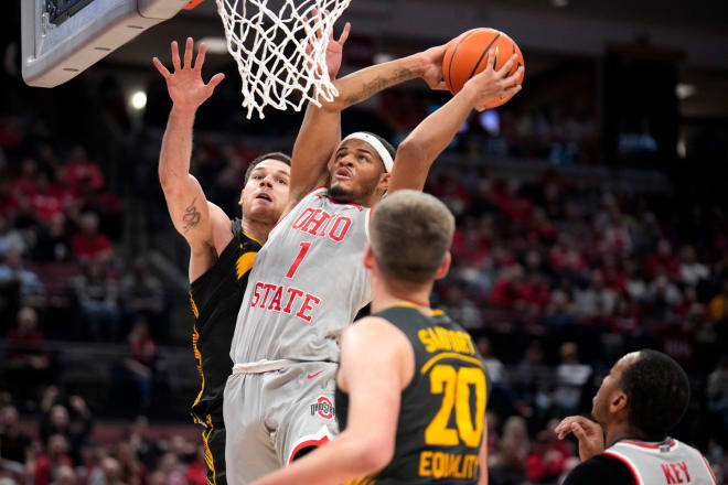 Ohio State's Roddy Gayle, Jr. slides through Iowa's defense for a dunk in Ohio State's 93-77 win over Iowa. 